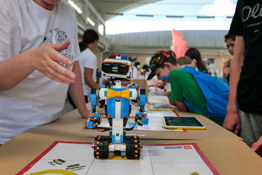 students are building robots and showing it