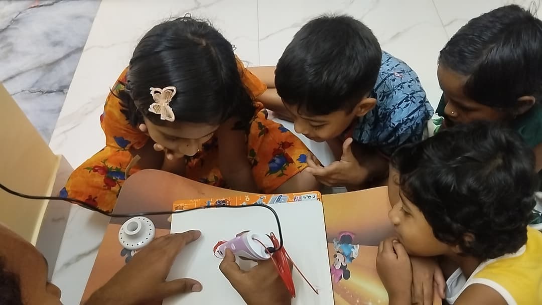 a kid showing a led display circuit