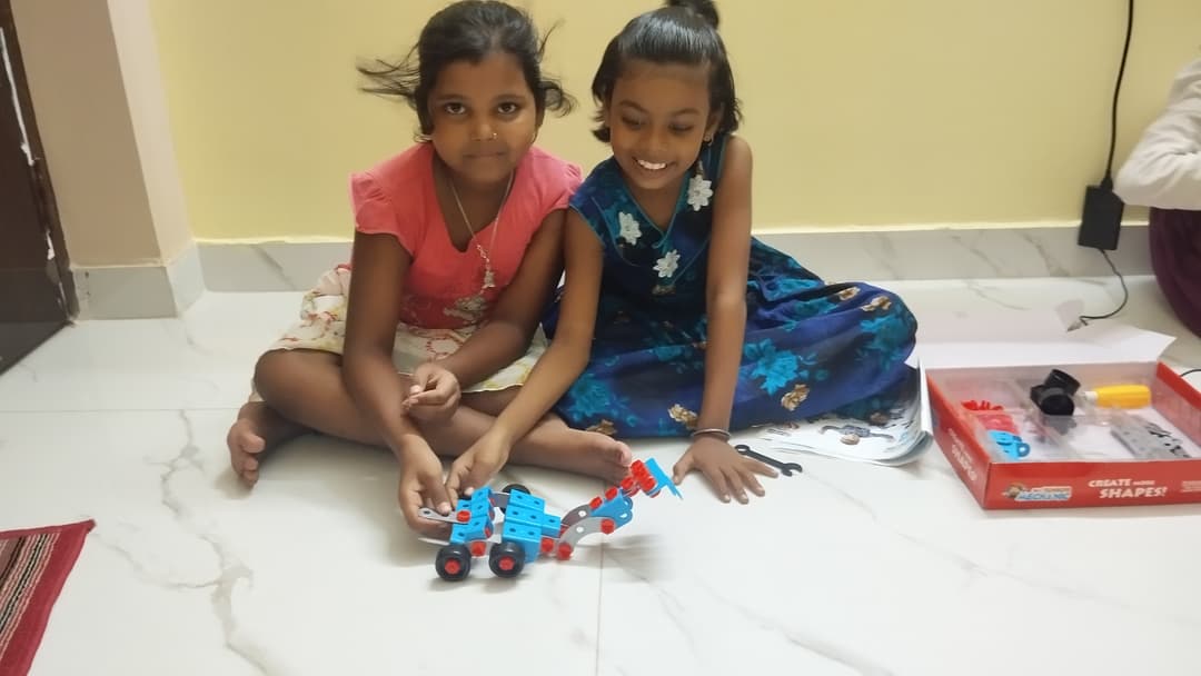 students are building robots and showing it